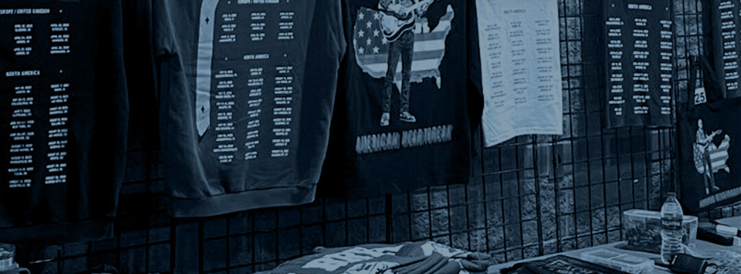 On-Scene & Online Merchandising — tour merch wall